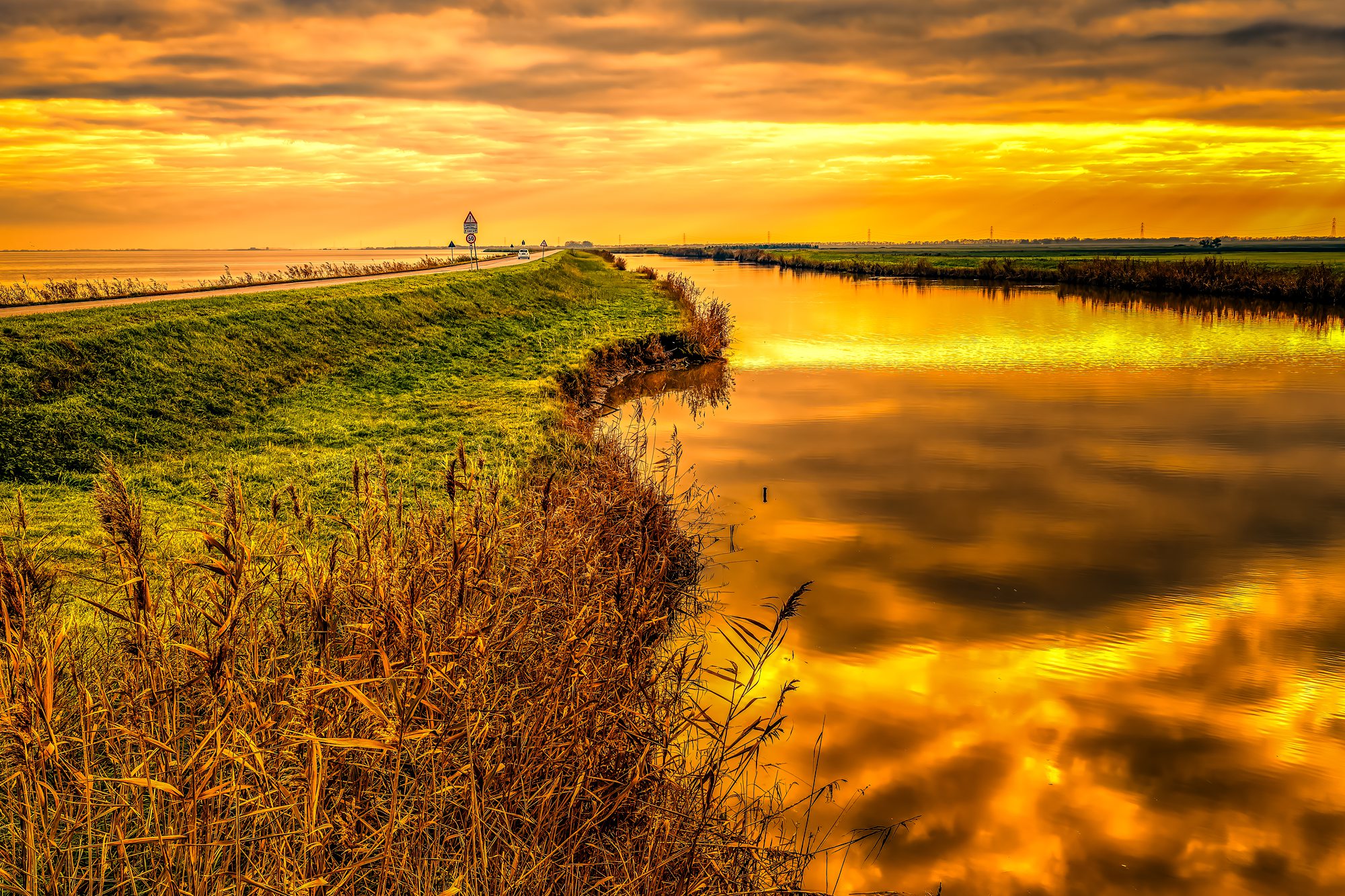 27 Golden Hour Along the Valli di Comacchio Road
