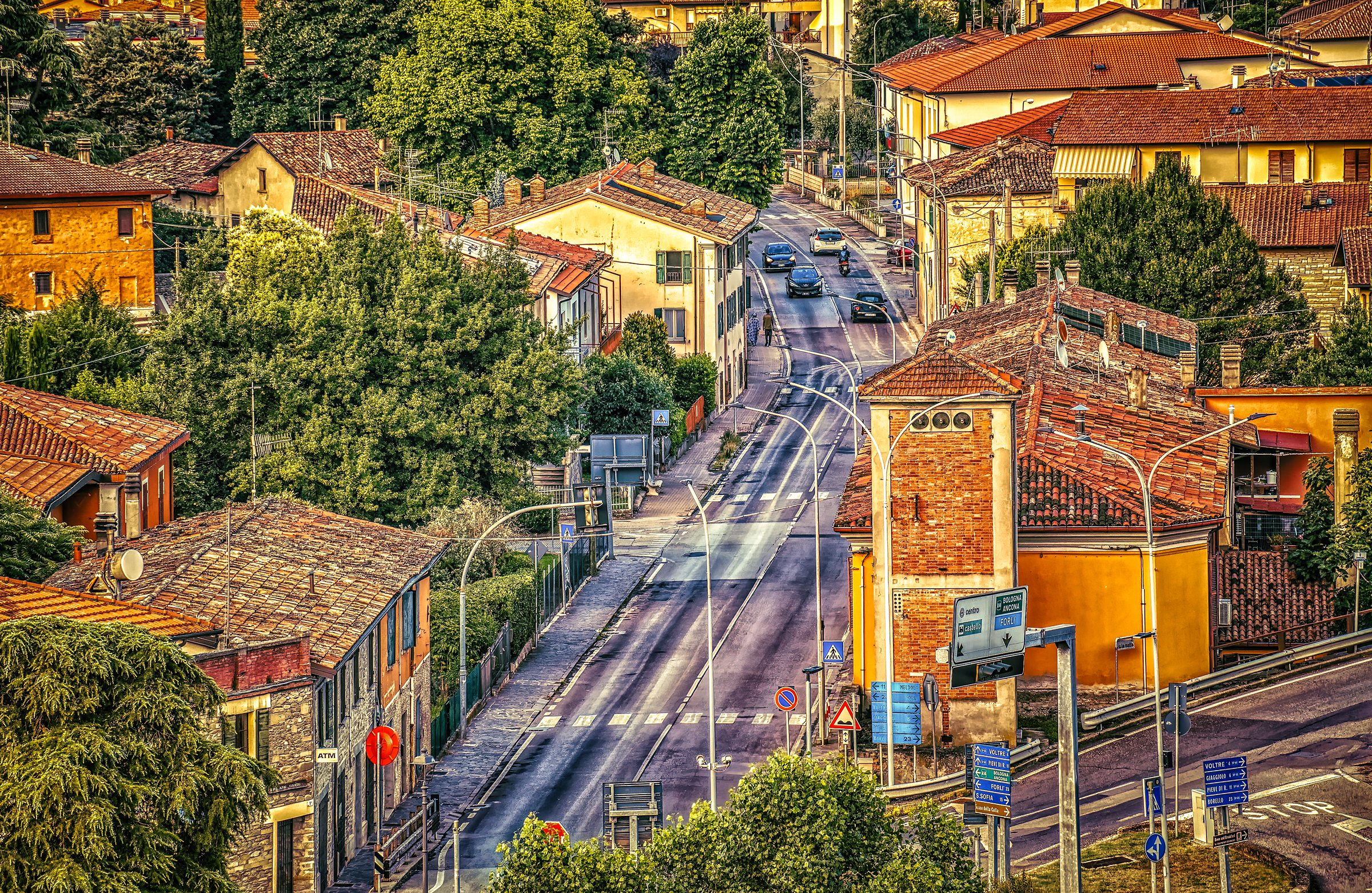Golden Hour in Cusercoli - Italian village main street aerial view with terracotta roofs