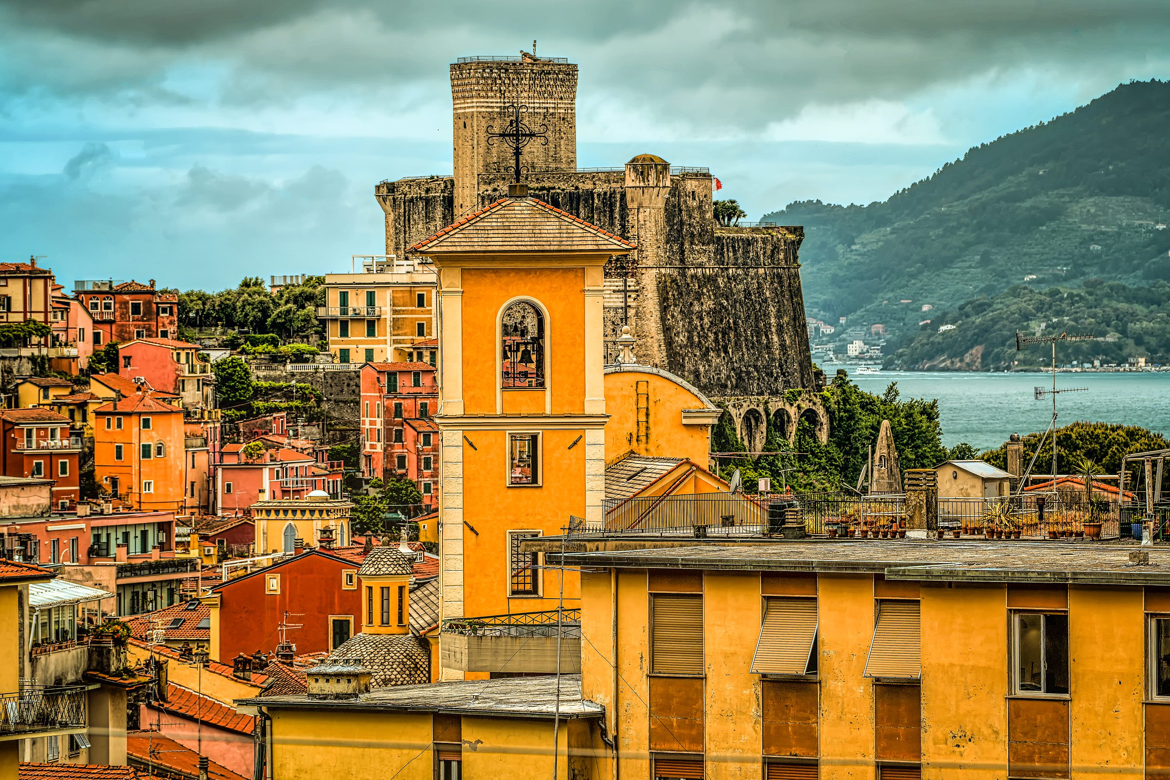Layers of Lerici - Colorful Mediterranean buildings with castle and sea view